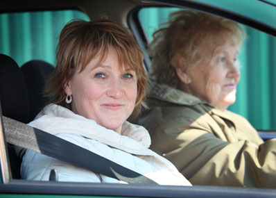 seniors driving in a vehicle