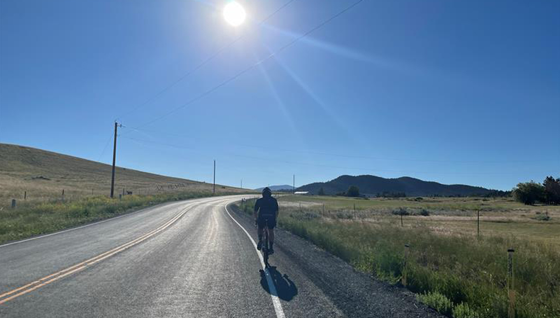 Bicyclist traveling on a Montana highway