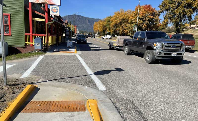 The Thompson Falls-Urban project included upgrades to 30 sidewalk curb ramps to meet ADA compliance, enhancing safety and accessibility for all users. 