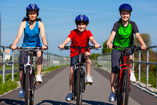 three bicyclists