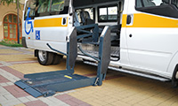 close up of loading wheelchair into van