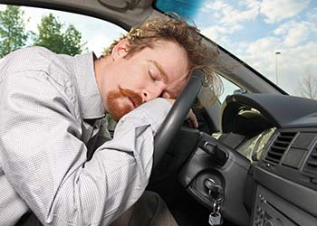 driver asleep on steering wheel